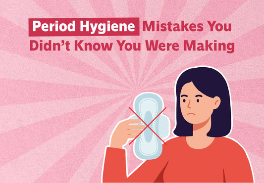 Woman holding a crossed-out conventional sanitary pad - switch to organic sanitary pads to avoid period rashes, cramps and infections